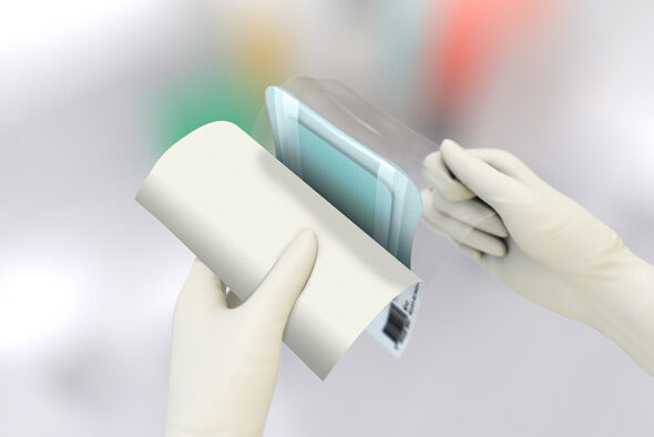 Person opens the inner packaging of a Cutimed Siltec Sorbact B dressing